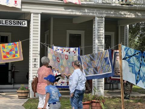 Contributed Photo The Blessing Hotel hosted the 1st Annual “Airing of the Quilts”, Saturday, April 20. The event kicks off the hotel’s quilt raffle for the July car show.