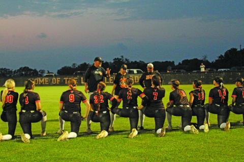 Photo by Anna Hernandez Lady Lep Head Coach Rebecca Hanson gives the girls a talk after the game with Danbury and lets them know they still have a lot of hard competition ahead of them for the playoffs.