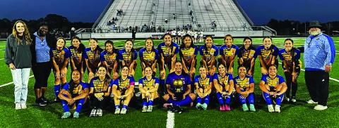 LeDarion Stone/Live in the Moment Photography The Lady Cats show off their area trophy after defeating La Vega last week.