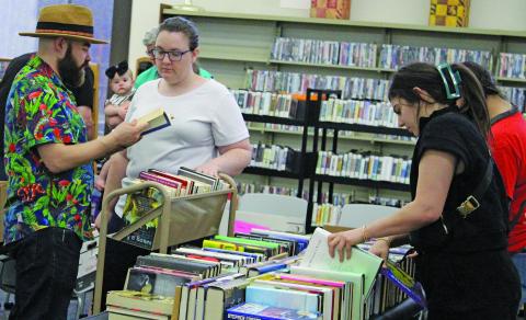 Friends of the Bay City Library held their annual spring book sale featuring paperbacks, hardbacks, audio books, and a variety of DVDs Saturday, April 13. The sale generated over $400 for the group to put towards future library programming. Sentinel Photo/ Jessica Shepard