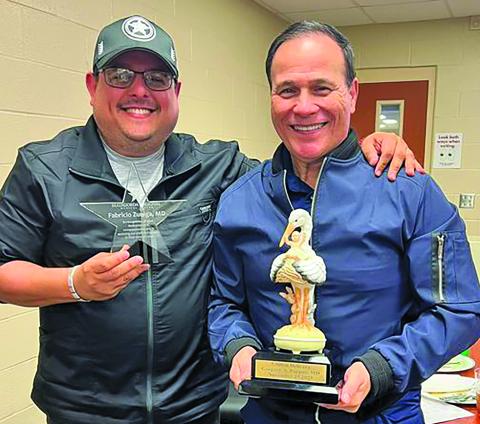 The MRMC Medical Staff recently honored Dr. Fabricio Zuniga and Dr. Gregory Pappas at their quarterly meeting. Zuniga was recognized for going above and beyond to help a nurse get a patient transferred to a higher level of care and Pappas was honored for his 5,000th delivery. Contributed photo