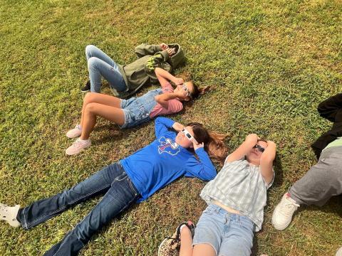 Contributed photo Markham Elementary students eclipse gazing Monday.