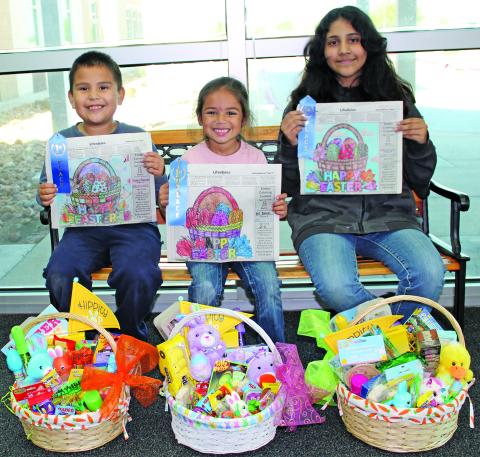 Sentinel Photo/Jessica Shepard This year's Sentinel Easter Coloring Contest winners are Anthony Palomares, Maggie Dean, and Jade Velazquez. Each winner received a blue ribbon for their artistry and an Easter basket full of treats.