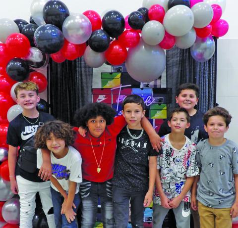 Contributed photo Tenie Holmes Elementary kids pose for a photo at the recent Sneaker Ball. 