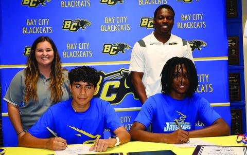 Monday, May 13, was signing day for Bay City High School student athletes Juan Martinez and Ke’Maurion Le’Day who signed the commitments with Cross Country Coach Rilea Sanders and Head Track Coach Robert Jones looking on. Both boys are continuing their education and athletic careers at Texas A&M Kingsville. Martinez will be running cross country and track, while Le’Day will be running track. LeDarion Stone/Live in the Moment Photography