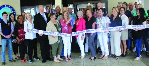 Sentinel Photo/Jessica Shepard Pelican Studios partnered with the Bay City Chamber of Commerce & Agriculture for an open house ribbon-cutting ceremony on April 30.