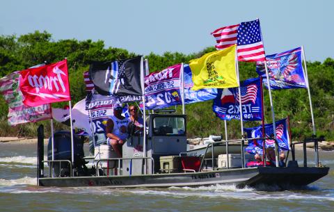 Sentinel Photo/MaLinda Reddell Supporters of former President Donald Trump proudly displayed their different Trump campaign flags for a boat parade Saturday, Sept. 7, on the Colorado River channel, starting near the mouth, and making its way up river. About 65 boats participated in the procession. 