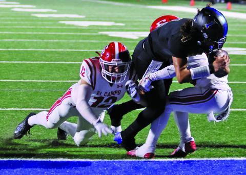 LeDarion Stone/Live in the Moment Photography Bay City’s senior quarterback Alex Estrada plunges ahead for a touchdown against El Campo Friday at Memorial Stadium.
