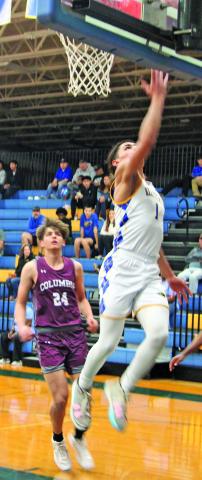 Sentinel Photo/Mike Reddell Blackcat senior guard Alex Estrada (1) makes a layup against Columbia here Friday, Feb. 7. The Blackcats defeated the Roughnecks 59-44 and have a 11-10, 6-7 record - fourth in district play. Bay City played Brazosport Monday, Feb. 10.