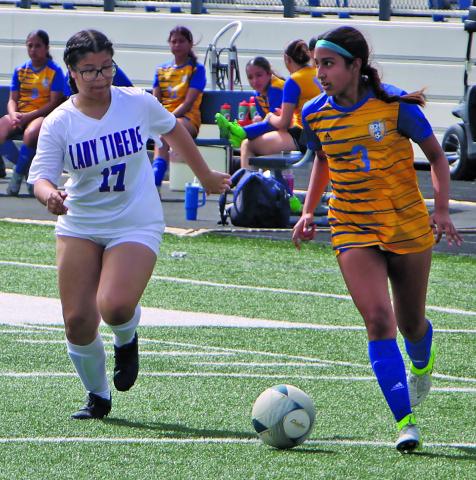 Sentinel Photo/Mike Reddell Lady Cat Peyton Benavides (3) moves the ball Saturday. The girls, 11-2-3, 6-0, and first in district, played Palacios Monday.
