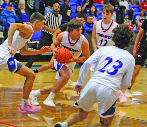 Sentinel Photo/Jessica Shepard Tidehaven’s Justin Griffith (11) heads down court in action against Palacios last Friday, when the Tigers beat the Sharks 59-42.