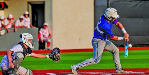 Migasproductions photo A Tidehaven batter steps up for a hit against Palacios in last week’s game.