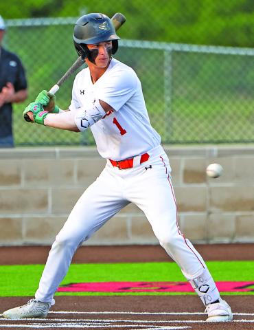Van Vleck Lep baseball won the Bi-District Championship by defeating Coldspring-Oakhurst 3-1 in the third game at Hitchcock ISD Bulldog Field last week. At left, Leopard Lincoln Roberts awaits the right pitch. Photo/Don Monroe