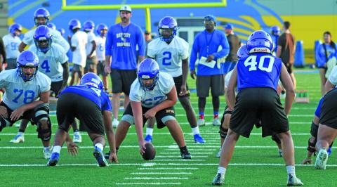 Photo by Anna Hernandez Blackcats go through the drills last week at two-a-days. Bay City will scrimmage Wharton there next Friday Aug. 15, at 6:30 p.m.