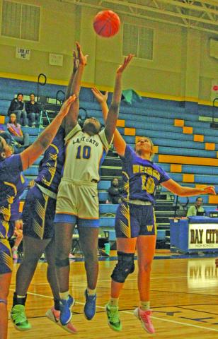 Photo/Anna Hernandez Lady Cat Sasha Onwacheckwa (10) goes up for a rebound during Bay City’s game with Weimer Nov. 18. 