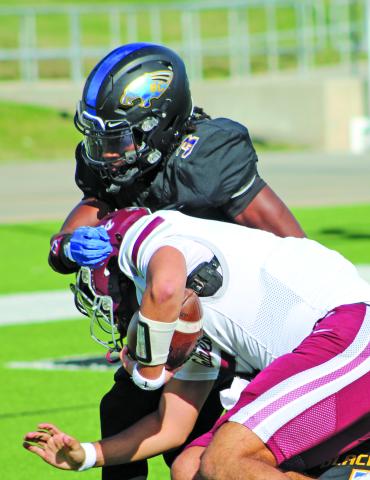Sentinel Photo/Mike Reddell Braden Jones (3) gets a hold of a Davonport running back.