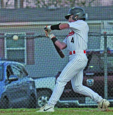 Photo by Anna Hernandez Van Vleck Leopard Brody Kaiser (4) gets ready to make contact with the ball on Tueday night, March 24, at a game against Hitchcock. Van Vleck, 13-5, 1-1, was to play at Brazos Tuesday, March 24, and will host East Bernard Friday, March 27.