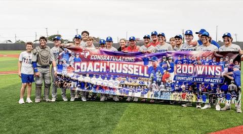 Contributed photo Tidehaven baseball players and staff congratulate Coach Eddie Russell on 200 wins and the many lives he has shaped along the journey.