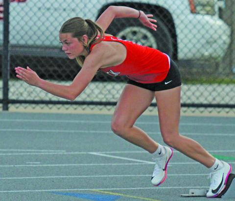 Photo by Anna Hernandez Van Vleck’s Peyton Van Dyke launches from the blocks for the 400 meter dash. 