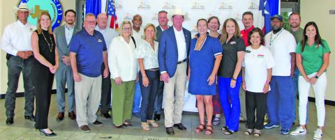 Sentinel Photo/Mike Reddell The Matagorda Day in Austin volunteers gathered May 16 for a group photo and chairman Jessical Russell outlined plans for the day to voice county concerns to the Legislature.