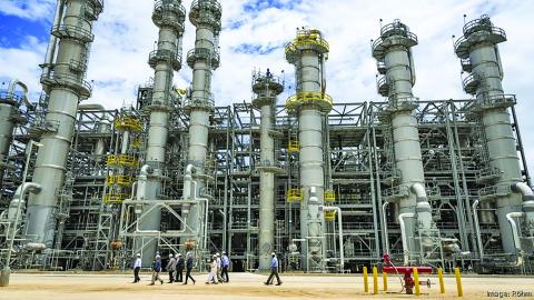 Houston Business Journal A group tours the new $1.6 billion plant during the opening ceremonies last week.