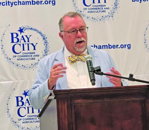 Sentinel Photo/Jessica Shepard Matagorda County Economic Development Corporation (MCEDC) Executive Director Mike Ferdinand spoke to more than 100 business professionals last week at Bay City Chamber of Commercee & Agriculture luncheon.