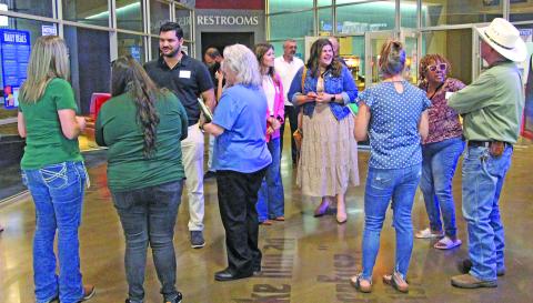 Sentinel Photo/Jessica Shepard Several business professionals take the time to network before Lynn Engineering's "How to Never Fail a Windstorm Inspection" luncheon on Wednesday, July 1.