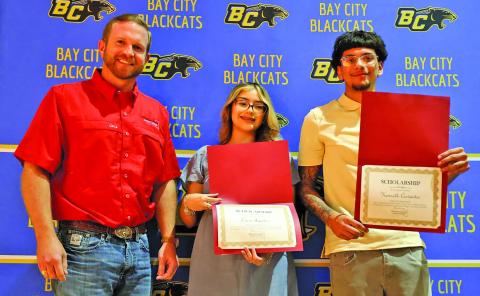 Scott Savage, WCJC Foundation Board Member, with Bay City High School graduates Ciara Aguilar and Kenneth Cervantes