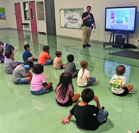 BCISD photo Officer Hlavinka preparing our Pre-K & Kindergarten students for emergency situations with the Standard Response Protocol created by The "I Love U Guys" Foundation.