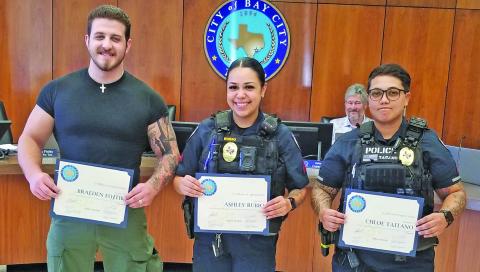 Sentinel Photo/Mike Reddell City Council recognized newly promoted Bay City Police officers last week. From left, are: Cpl. Braeden Fojtik, Cpl. Ashley Rubio, and Cpl. Chloe Taitano. Not pictured Sgt. Dillon Wakefield.