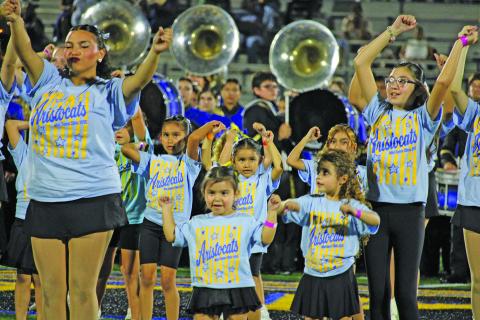 It was Lil A-Cat night at Memorial Stadium as these little ones join Bay City Aristocats during the halftime performance with the BCHS Band at the Bay City-West Orange Stark football game. For game coverage, see Page 6. Sentinel Photo/Mike Reddell