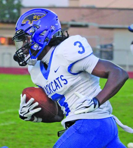      Blackcat punt returner Bradon Jones (3) breaks upfield against Furr last Thursday. Jones had 125 yards on three returns. Sentinel Photo Mike Reddell