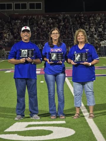 Tidehaven ISD photo  Three Tidehaven Athletic Hall of Fame inductees: Robert Dannels, Bridgette McKissick Dannels, and Stacy Pierce Wolf,  were honored at halftime of the Tidehaven-Ganado football game Friday, Aug. 28. Before the game, the inductees gathered with their families and friends for a small reception. At halftime, our inductees were proudly presented to the Tidehaven community and honored with plaques that will hang in the Dome. 
