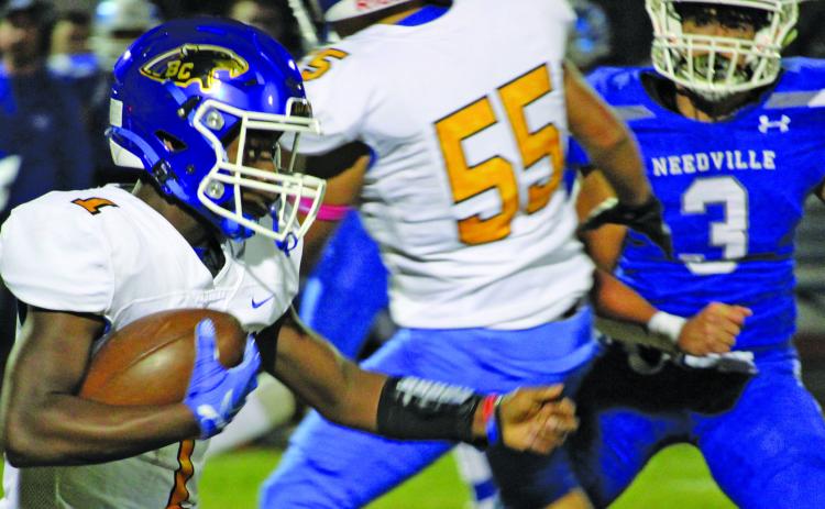 Sentinel photo/Mike Reddell Blackcat freshman running back Jada Andrews (1) tries to follow blockers against Needville last week.