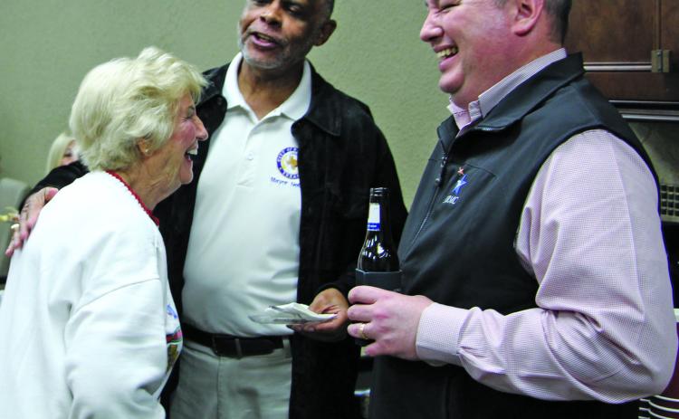 Sentinel photo/Jessica Shepard Above, from left, Alice Lowery, Mayor Robert Nelson, and MRMC CEO Warren Robicheaux share a laugh Nov. 18, when the MRMC Foundation partnered with Bay City Chamber of Commerce and Agriculture to host Business After Hours.