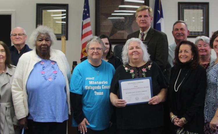 Sentinel photo/Mike Reddell Members of the Matagorda County Historical Commission joined Matagorda County Commissioners Court members Monday, Jan. 24, when the court presented the Distinguished Service Award to MCHC for its dedication and hard work during the 2020 year of service.