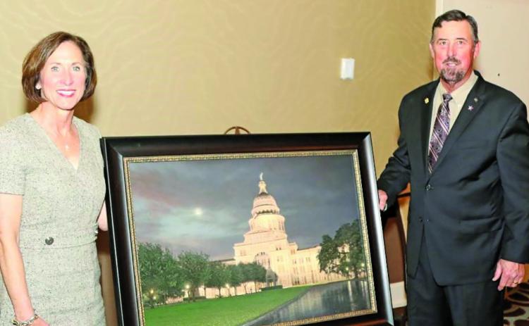 Contributed photo Senator Kolkhorst is presented the S.M. True Agricultural Champion Award from TFB President Russell Boening