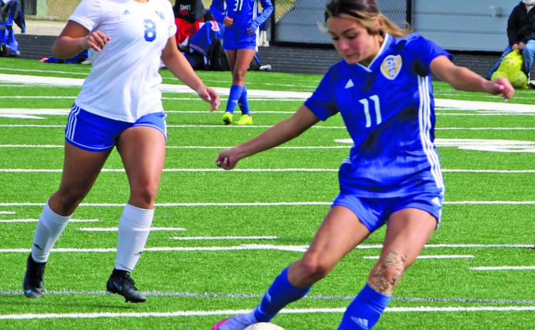 Ladycat Alyssa Castro prepares for a shot at the goal in the first half. Castro accounted for two goals.  Sentinel photo/ Mike Reddell