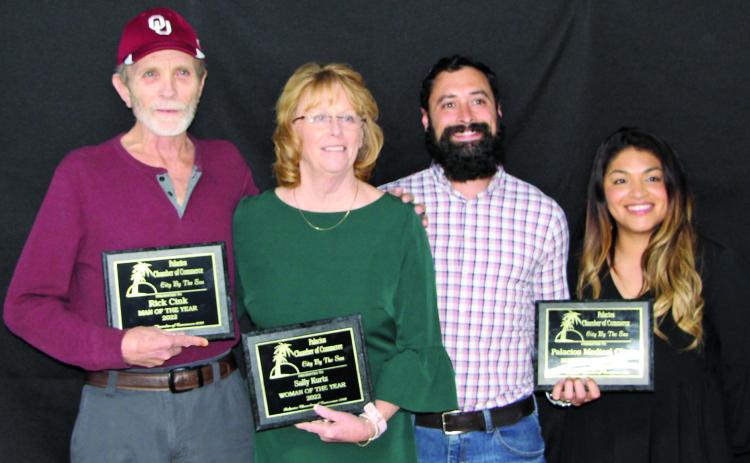 Sentinel photo/MaLinda Reddell Palacios Chamber of Commerce banquet honorees Feb. 17 were, from left, Rick Cink, Man of the Year; Sally Kurtz, Woman of the Year; and Palacios Medical Center, Business of the year.