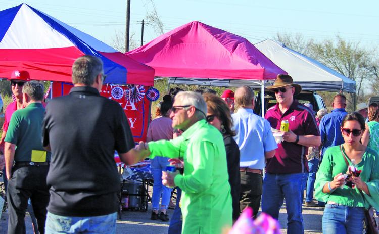 Sentinel photo/Mike Reddell The 12th Annual Great Steak Cook-Off Saturday drew impressive crowds for an early bout of warm weather and a chance to socialize.