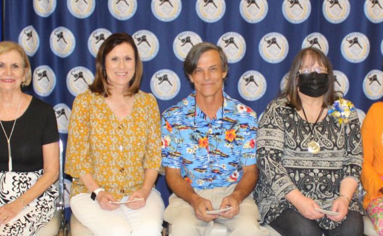Sentinel photo/Jessica Shepard Bay City ISD employees were recognized for their retirement at the annual employee banquet Thursday, May 19. Those employees are Martha Johnson, Lisa Stuhler, Daniel Tinus, Leslie Stevens, and Donnye Stone. Retirees are flanked by BCISD school board President Jill Westmoreland and trustee Priscilla Robinson. Not pictured is retiree Lisa Volkmer.