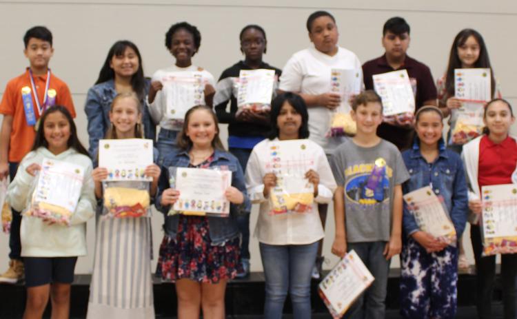 Sentinel photo/Jessica Shepard Bay City Lions Club members Mike Finster and Ed Weddell handed out Academic Achievement awards for Tenie Holmes Elementary students that had "All 'A' Honor Roll" for the entire school year, Thursday, May 26. Those students are: Dhani Burnett, Mason Cowart, Merrett Fortenberry, Bliss Garcia, Avery Hernandez, Amira Hoque, Suri Marquez Flores, Yoselin Martinez, Favour Onwuchekwa, Eva Schneider, Bailey Thomes, Taelynn Tinnin, Lillian Wurtz, and David Zamora.