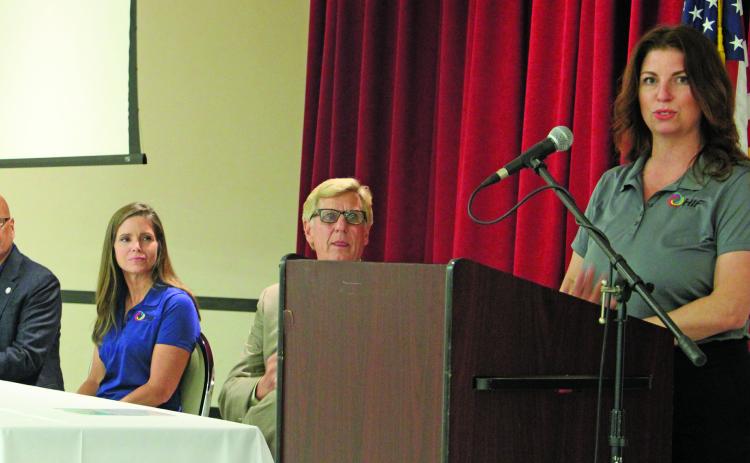 Sentinel photo/Jessica Shepard HIF Chief Operations Officer Brooke Vandygriff, right, presented a PowerPoint informational session on HIF's plans for its Matagorda County eFuels production facility on Aug. 30. Vandygriff explained that the company was concentrating on on-site work at the moment but would pursue beginning construction in 2023.