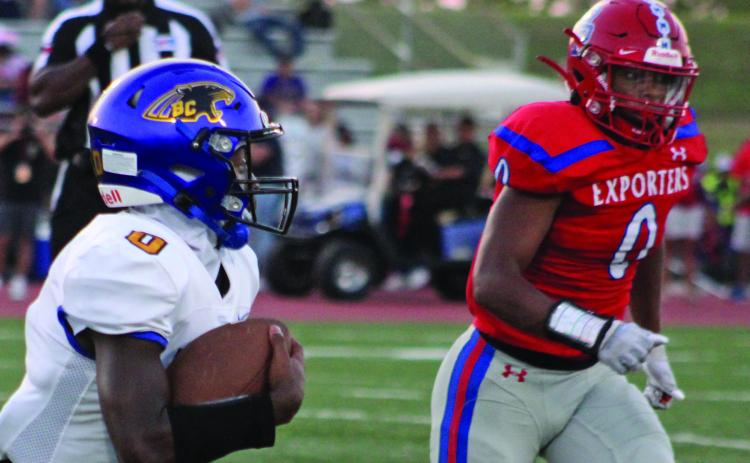 Sentinel Photo/Mike Reddell Blackcat sophomore running back Jada Andrews (0) looks to get around Brazosport defenders.