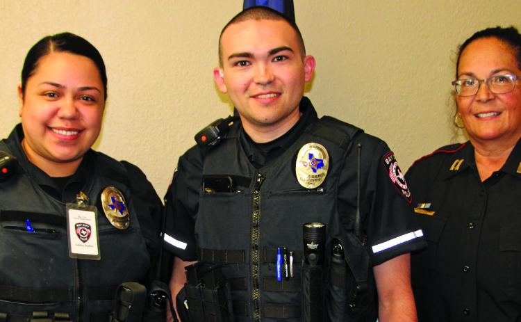 Sentinel Photo/Mike Reddell Bay City Police Department swore in two new officers in an Oct. 19 ceremony. Shown, from left, new officers Ashley Rubio and Tyler Jackson, with Interim Police Chief Christella Rodriguez.