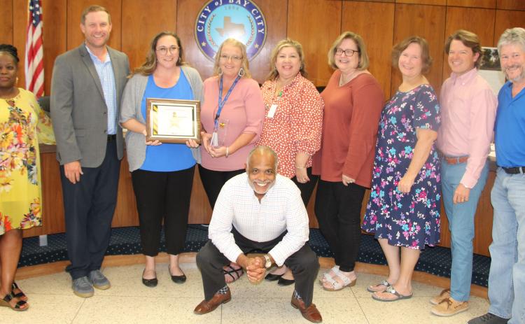 Sentinel Photo/Mike Reddell Council heard from Katy Plunkett (with certificate), Municipal Court Administrator, who created an outreach program geared for car seat and seat belt safety for children, reaching as many schools as possible in the first week of November.