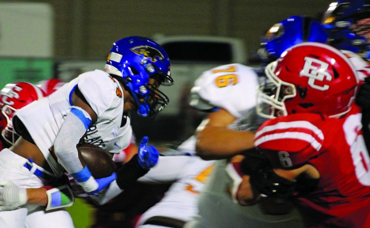 Sentinel Photo/Mike Reddell Blackcat junior running back Paris Fox (14) gets behind his blockers, including Marco Mata (76) for a gain against El Campo.