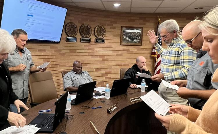Contributed photo Van Vleck ISD Superintendent's Secretary Pat Hackworth, left, swears in school board members Tony Kucera, Laura Kubecka, Marcus Moss, and Donnie O'Connell during the board's regular meeting Monday, Nov. 14.