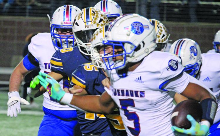Sentinel Photo/Mike Reddell Tidehaven running back Joseph Dodds picks up yardage against Poth in the quarterfinal game at Texas State stadium Friday, Dec. 2.