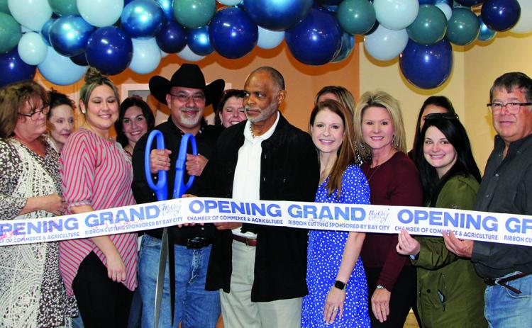 Sentinel photo/Mike Reddell Help, Inc. held its grand opening ribbon cutting Thursday, Jan. 12. The store is located at 2140 Avenue F in Bay City.